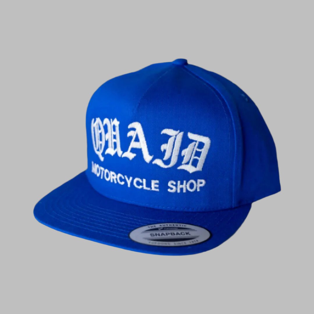 Quaid Motorcycle Shop Blue Classic Trucker Hat with white stitching for sale at Quaid Motorcycle Shop or at Quaid Harley-Davidson in Loma Linda, Ca.