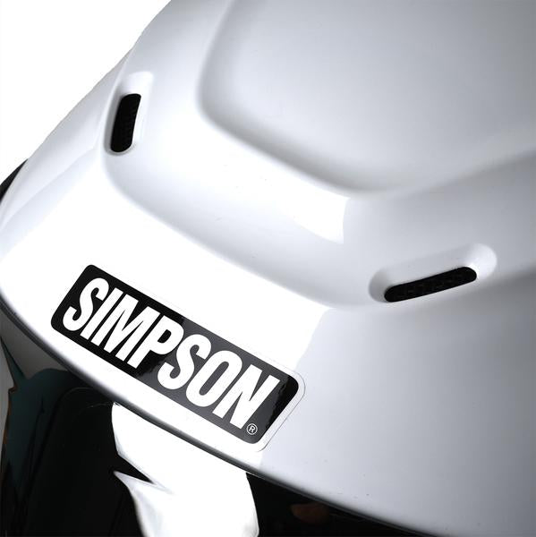SIMPSON SPEED BANDIT MOTORCYCLE HELMET for sale at Quaid Motorcycle Shop or at Quaid Harley-Davidson in Loma Linda, Ca. showing close up of Simpson motorcycle helmets logo on gloss white helmet