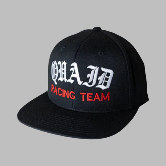 Quaid Harley-Davidson Racing Team classic trucker flexfit hat in black with red and white stitching